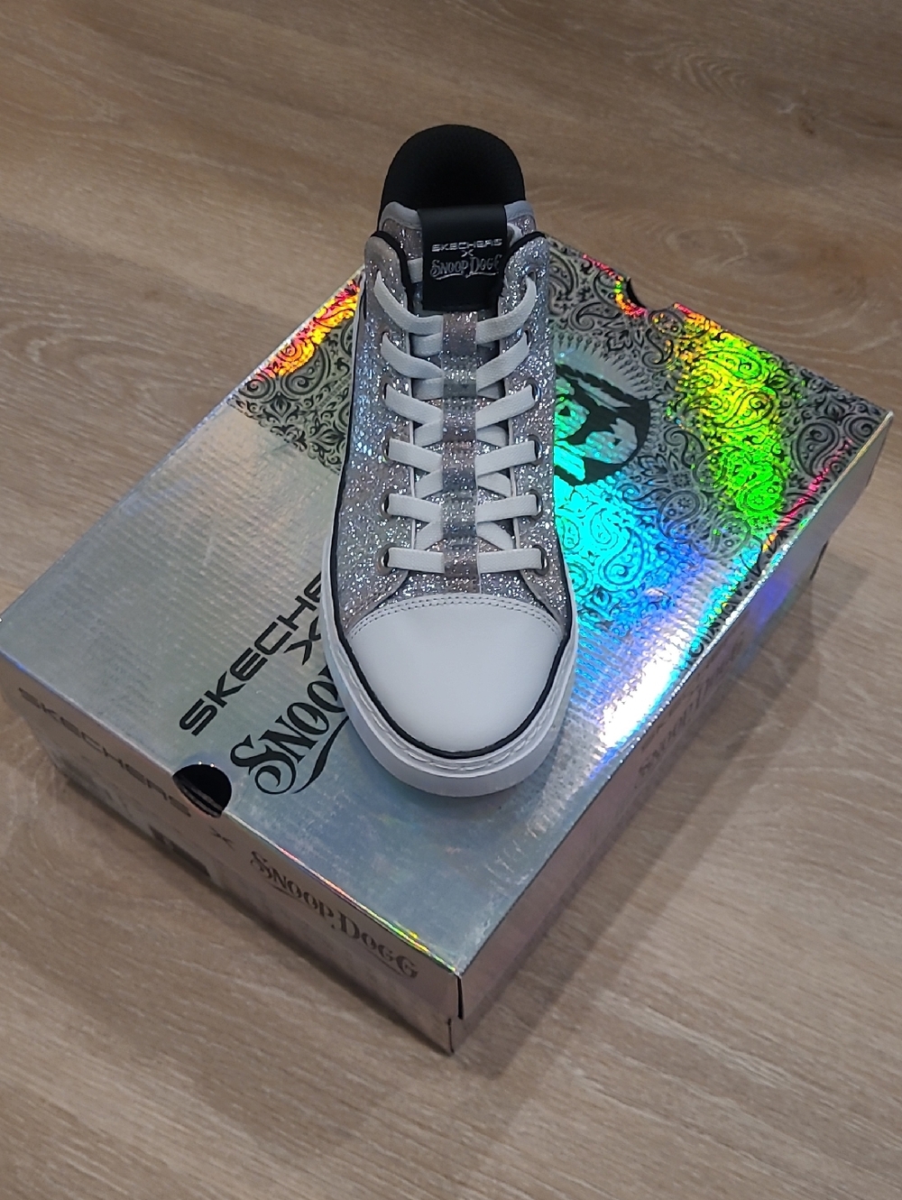 SKETCHERS X SNOOP DOGG Glitter Low-Top Sneaker in Silver and White with Black